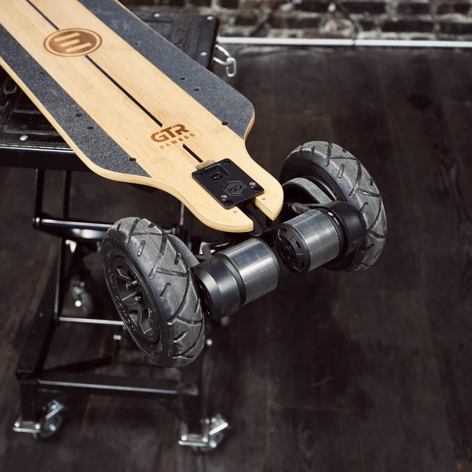 Close Up shot of the rear of the Evolve GTR Bamboo All Terrain Kit displaying the motors, pulleys and bash guards. 