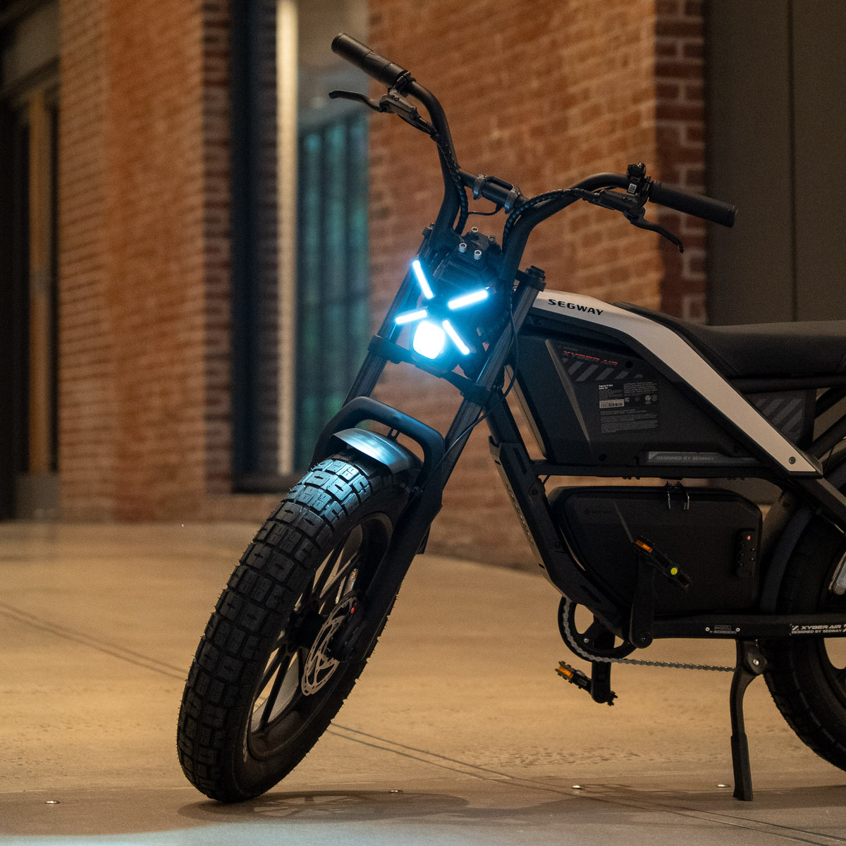 Segway Xyber Air front three-quarter view with LED headlight on