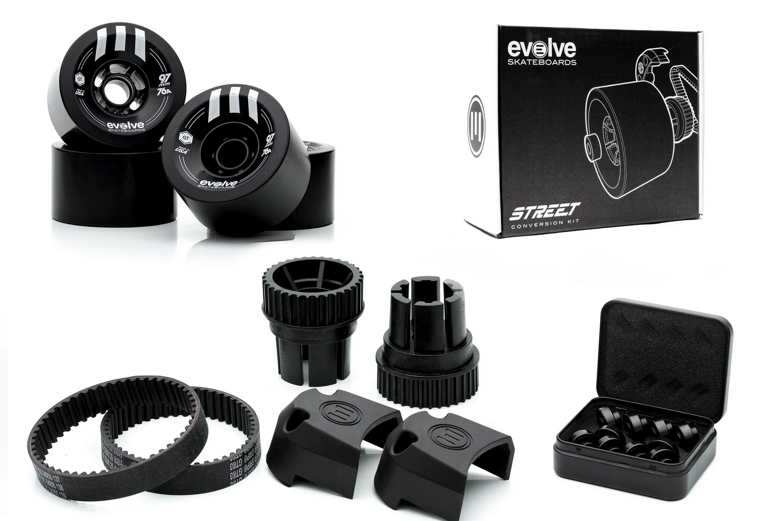 Boxed Street Conversion Kit beside new set of Orange Caguama street wheels